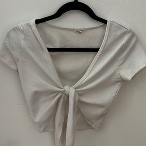 A cropped short sleeve white tie top from Garage! Super cute!